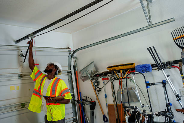 Professional Garage Door Spring Repair technician working in Alamo Heights, TX